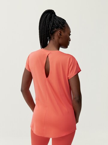 Born Living Yoga Functioneel shirt 'Aina' in Oranje