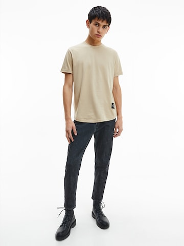 Maglietta di Calvin Klein Jeans in beige