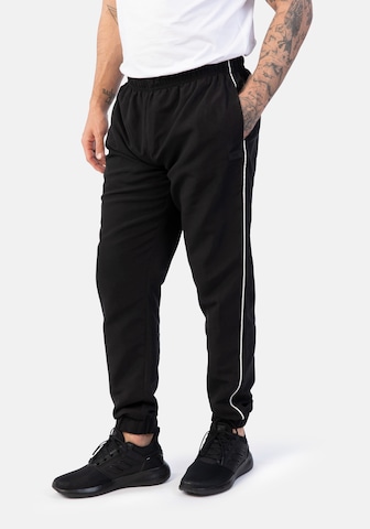 Effilé Pantalon de sport Hero en noir