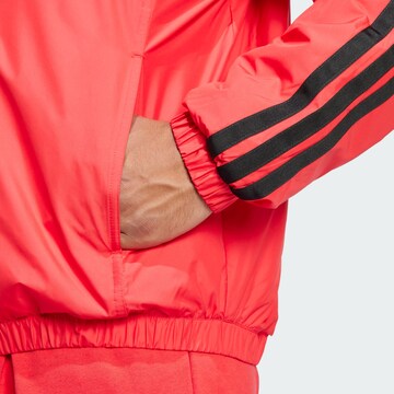 ADIDAS SPORTSWEAR Sports jacket 'Essentials' in Red