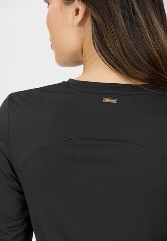 Athlecia Langarmshirt Doja in Schwarz