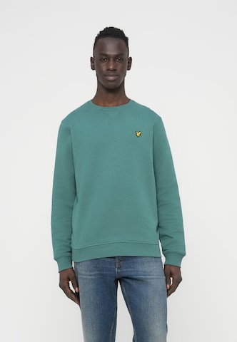 Bluză de molton de la Lyle & Scott pe verde: față