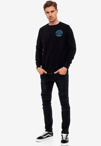 Rusty Neal Sweatshirt in Schwarz