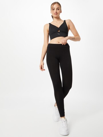 PUMA Skinny Sportbroek in Zwart