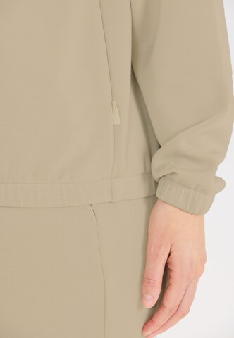 Athlecia Sweatshirt in Beige