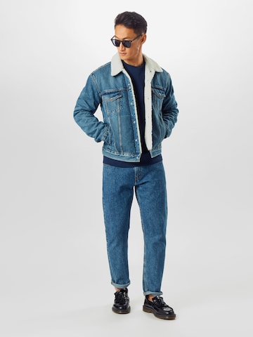 LEVI'S ® Between-Season Jacket 'Type 3 Sherpa Trucker' in Blue