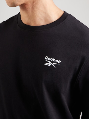 ReebokTehnička sportska majica - crna boja