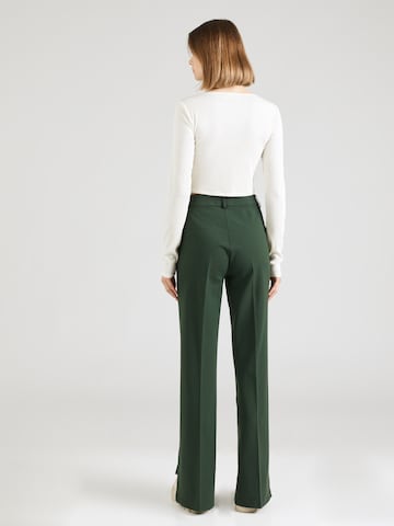 florence by mills exclusive for ABOUT YOU Flared Παντελόνι με τσάκιση 'Tela' σε πράσινο