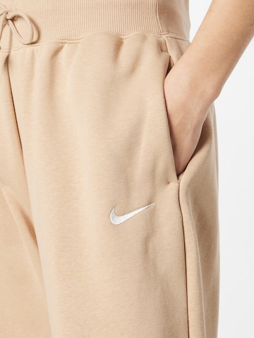 Nike Sportswear Zúžený strih Nohavice - Béžová