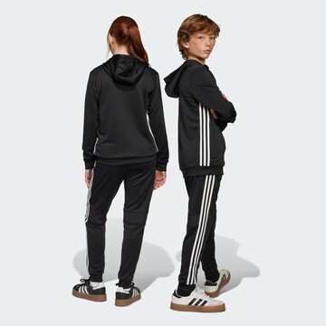 Tapered Pantaloni sportivi 'Tiro 25 Essentials' di ADIDAS PERFORMANCE in nero