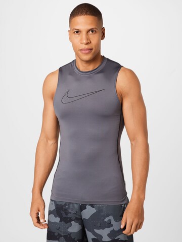 T-Shirt fonctionnel NIKE en gris : devant