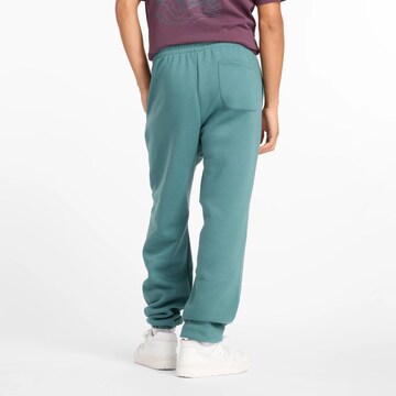 Effilé Pantalon 'Essentials' new balance en vert