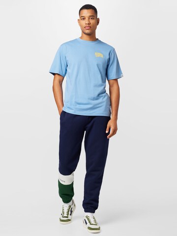 LACOSTE Tapered Trousers in Blue