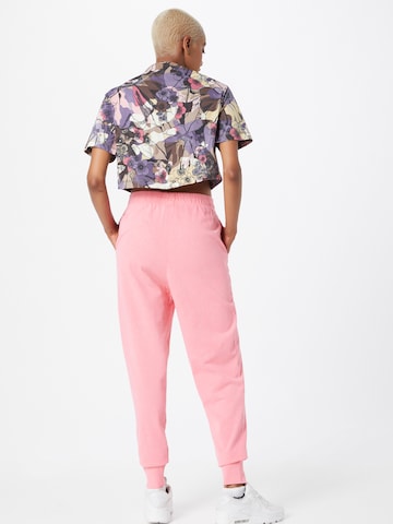 Nike Sportswear Tapered Pants in Pink