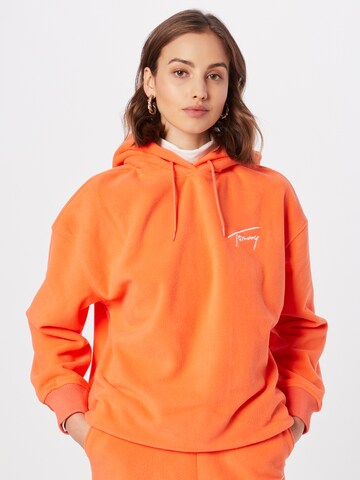 Tommy Jeans Sweatshirt in Oranje: voorkant