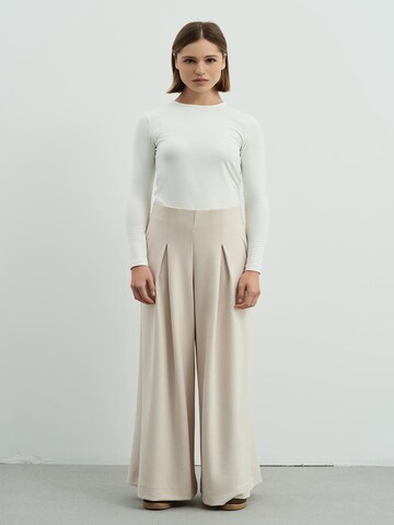 C&City Pleat-Front Pants in Beige: front
