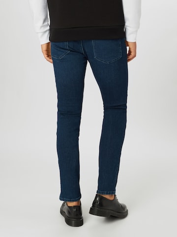 HUGO Red Slimfit Jeans 'HUGO 734' in Blauw