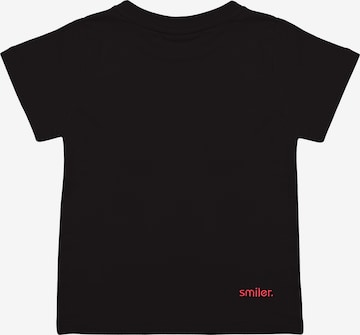 T-Shirt smiler. en noir