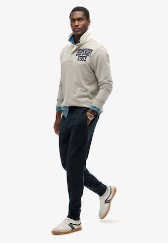 Superdry Tapered Hose 'Essential' in Blau
