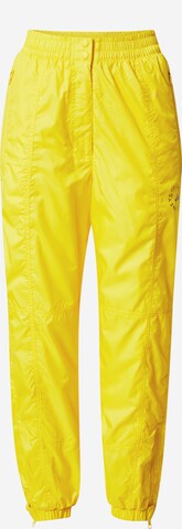 Effilé Pantalon de sport 'Lined Winter' ADIDAS BY STELLA MCCARTNEY en jaune : devant