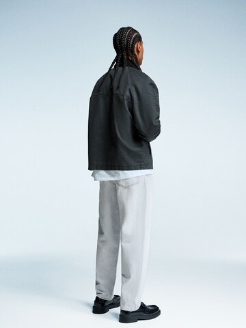 Bershka Tapered Jeans in Blue