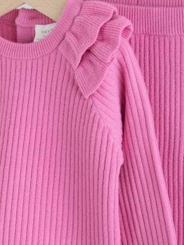 Set Next en rose