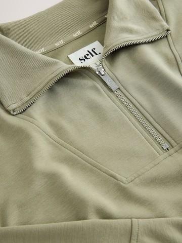 Felpa di self. in verde