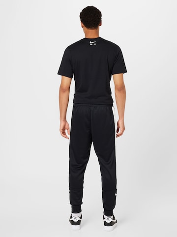 Nike Sportswear regular Λειτουργικό παντελόνι 'AIR' σε μαύρο