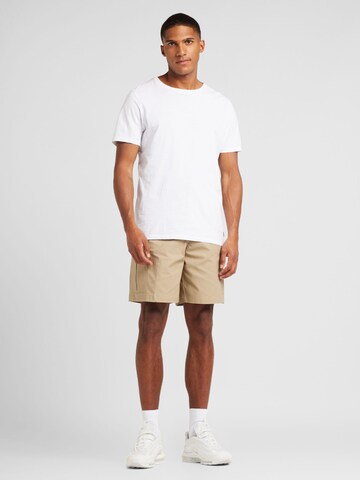 Regular Pantalon cargo 'CLUB' Nike Sportswear en vert