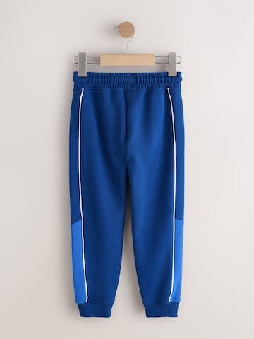 Next Zúžený Kalhoty – modrá