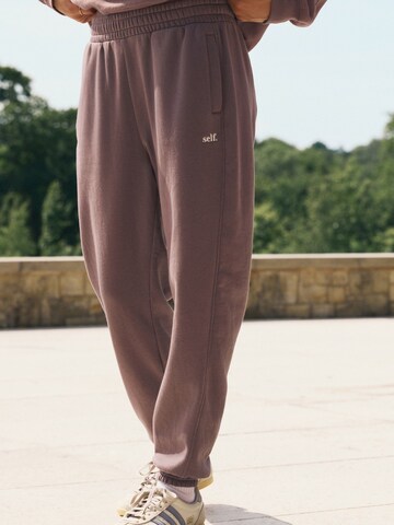 Next Tapered Hose in Braun: Vorderseite
