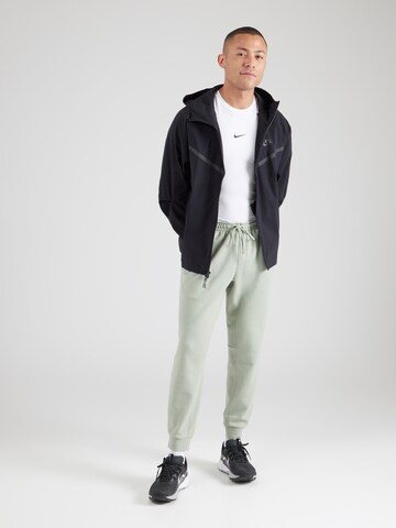 NIKE Конический (Tapered) Спортивные штаны 'PRIMARY' в Зеленый