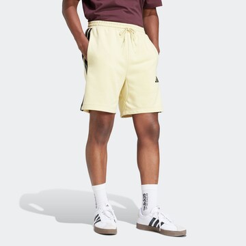 ADIDAS SPORTSWEAR Regular Sports trousers 'Essential' in Yellow
