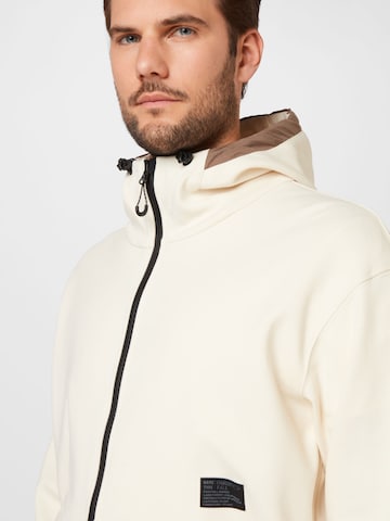 Veste de survêtement OAKLEY en beige