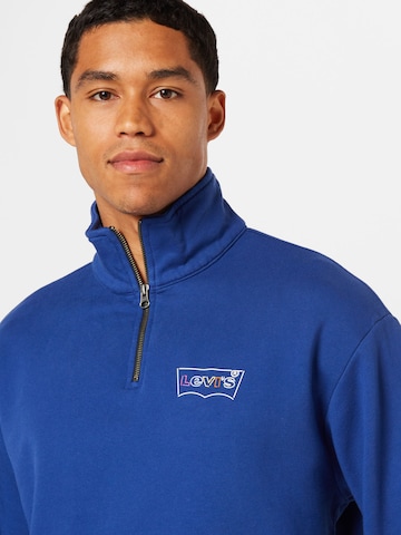 LEVI'S ® Sweatshirt 'RLXD Graphic 1/4 Zip Pkt' in Blue