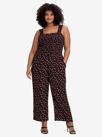 SHEEGO - Jumpsuit en negro: frente