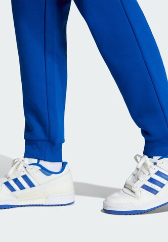 Effilé Pantalon de sport ADIDAS ORIGINALS en bleu