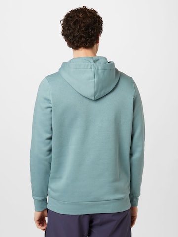 UNDER ARMOUR Sportsweatshirt 'Essential' in Groen