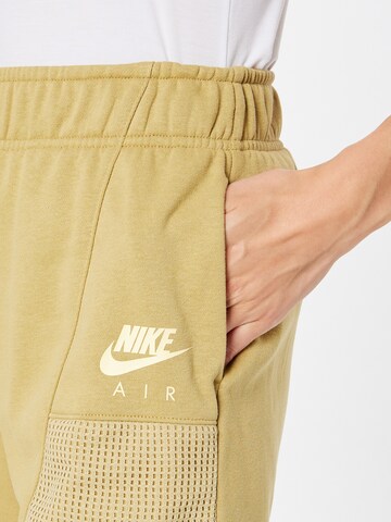 Nike Sportswear Štandardný strih Nohavice - Žltá