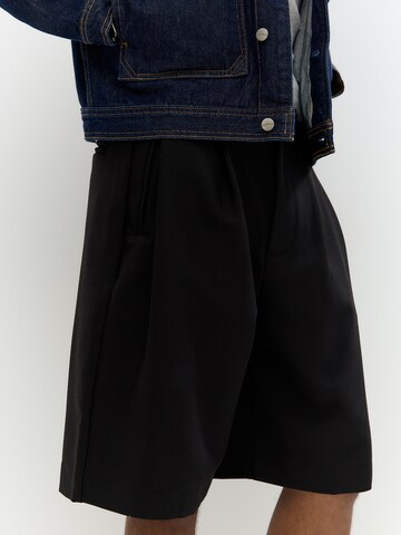 Baggy Pantalon à pince Pull&Bear en noir