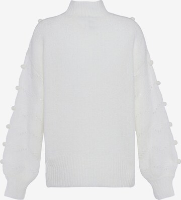 Pullover di faina in bianco