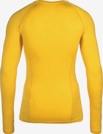 Base layer 'Liga' di PUMA in giallo