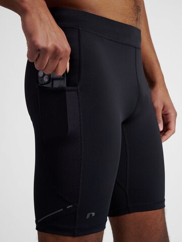 Skinny Pantalon de sport 'Race' Newline en noir