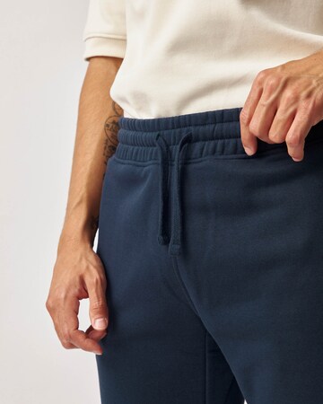 SNOCKS Tapered Sporthose in Blau