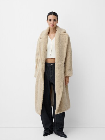 Bershka Between-Seasons Coat in Beige: front