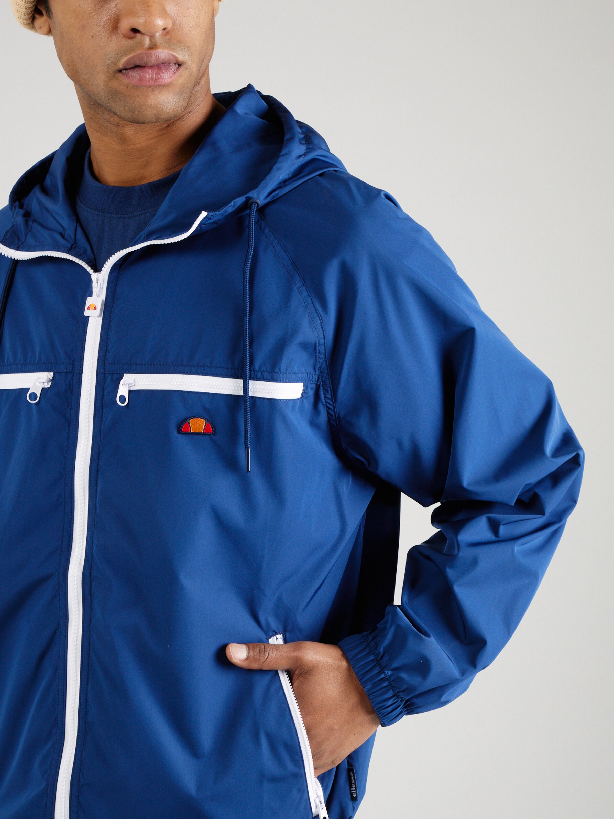 Veste mi saison Patinia ELLESSE en Bleu Marine ABOUT YOU