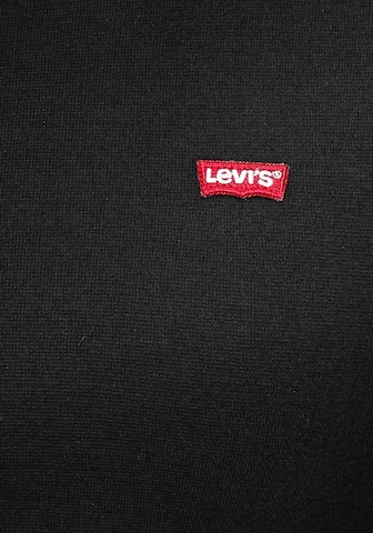 LEVI'S ® Paita 'LS Baby Tee' värissä musta