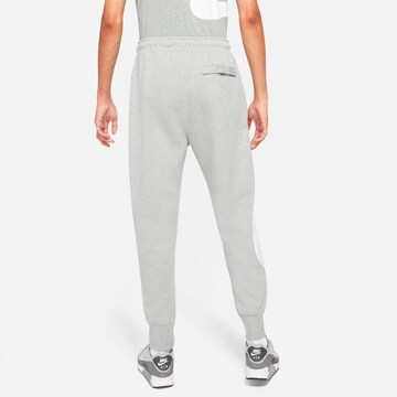 Nike Sportswear Tapered Pants 'Swoosh Tech' in Grey