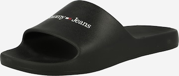 Claquettes / Tongs Tommy Jeans en noir : devant