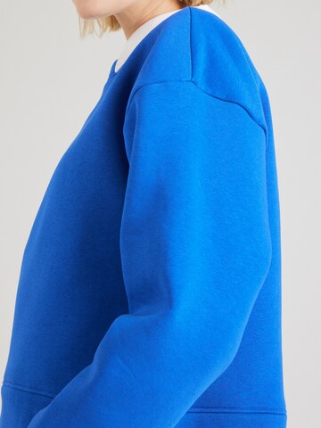 ABOUT YOU Sweatshirt 'Daniela' in Blue